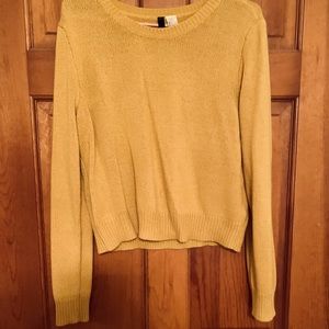 Sweater
Super cute with colored top underneath with mom jeans or boyfriend jeans